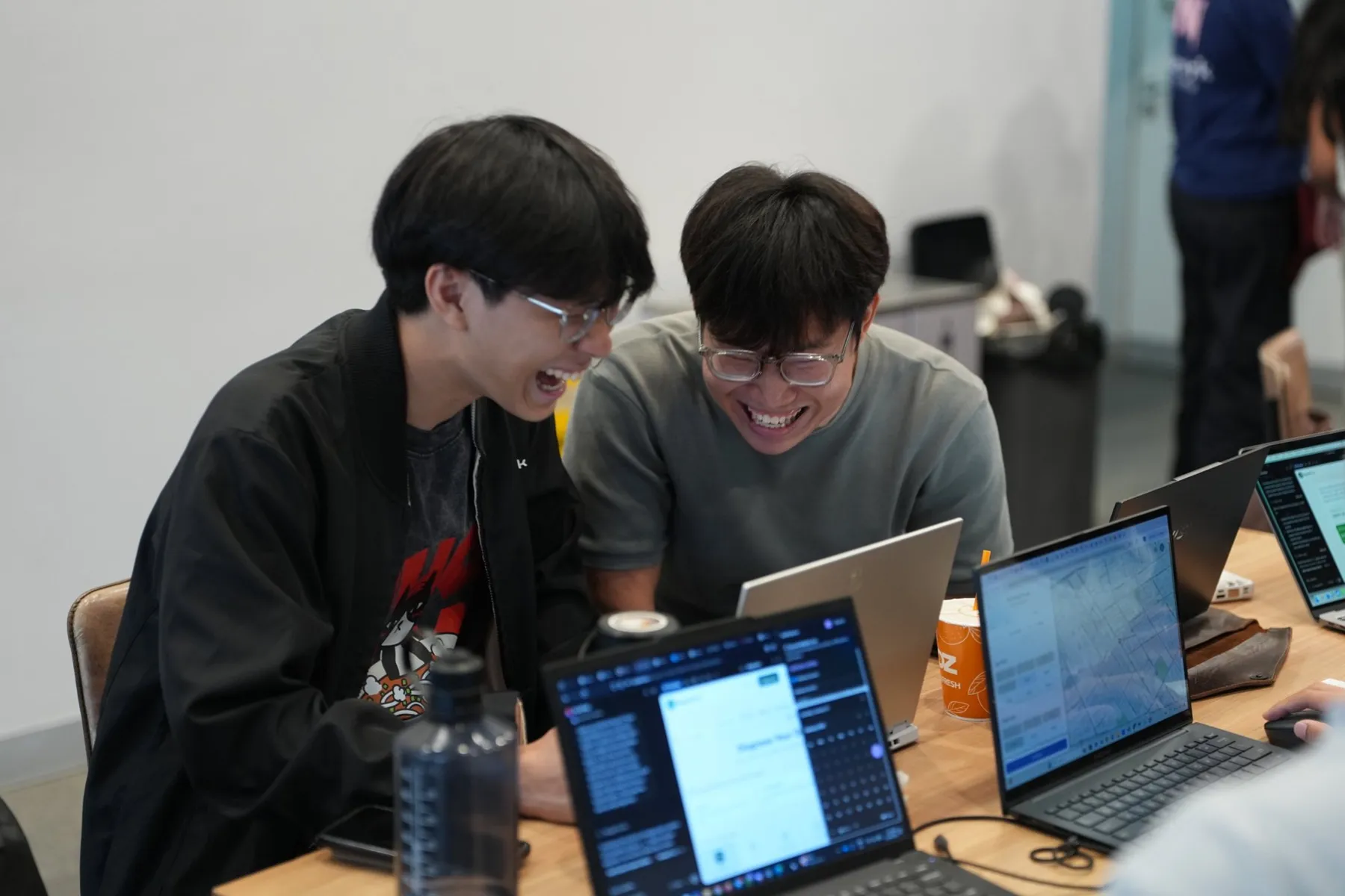 Two students building together